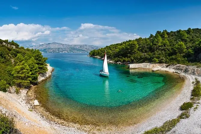 Sailing boat in a quiet Adriatic bay